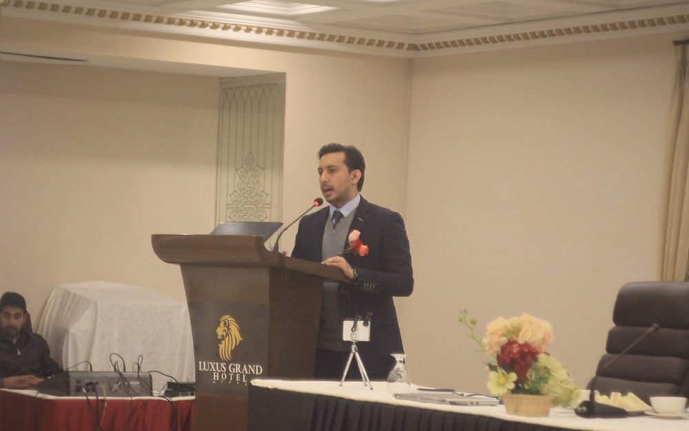 Muhammad Haris presenting at a pharma conference